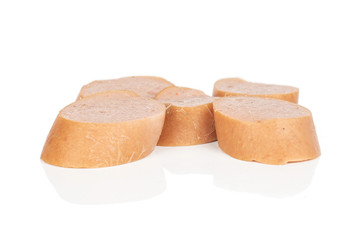 Group of five slices of pork frankfurt sausage isolated on white background