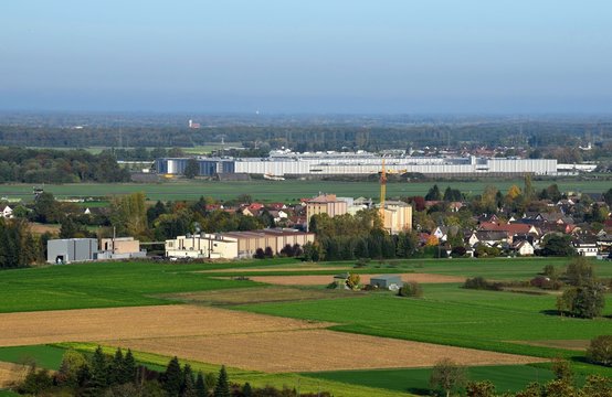 view from the Schutterlindenberg towards the town of Hugsweier and industrial district in Lahr, Baden Germany