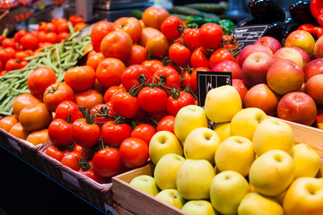 Shop window. Fresh vegetables and fruits in baskets. Market place. Space for a text.