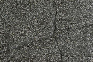 Concrete floor covering with cracks and inclusions
