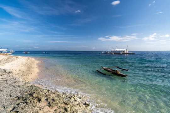 liloan beach on cebu, philippines. blue nice water for swimming relaxing snorkeling