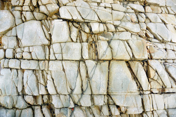 Abstract design of a stone in the beach