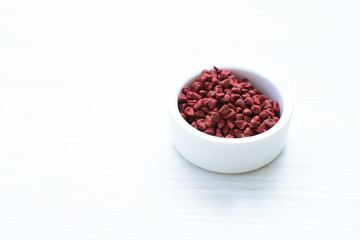 Achiote seed called Bixa orellana of America, used to flavor food