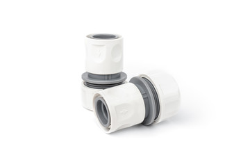 White garden water hose connector isolated on white background.