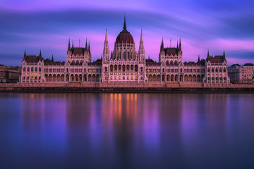 Fototapeta na wymiar Hungarian Parliament Building in Budapest at sunset with Danube river