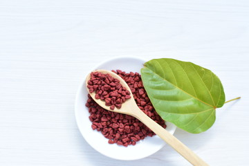 Achiote seed called Bixa orellana of America, used to flavor food