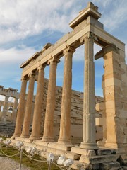 The Erectheion temple, in the ancient Acropolis, under the morning light, in Athens, Greece