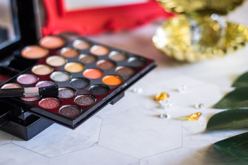 A multicolored set of shadows and blush. Cosmetics for girls and women.