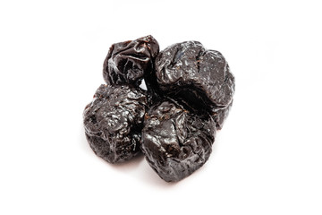 dried plums isolated on white background