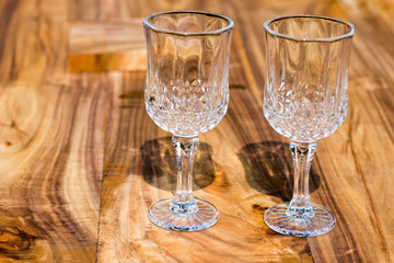 empty wine glasses with wooden background