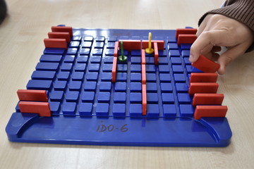 a board game and playing hand