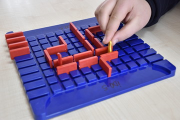 a board game and playing hand