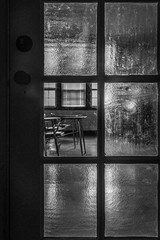 Looking inside classroom through window in door