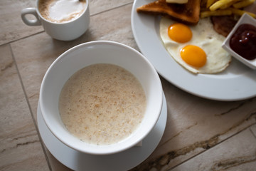 Oatmeal and Scrambled Eggs with Breakfast Toast