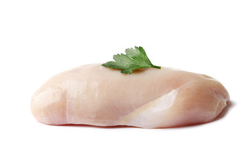 raw chicken fillet with parsley isolated on a white background