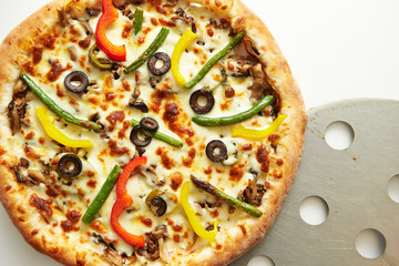 Vegetable pizza on white background 