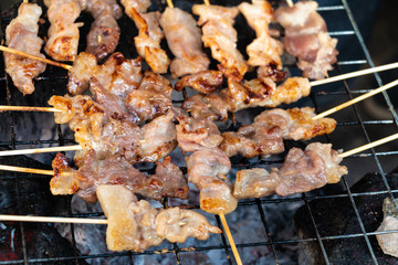 grilling pork in local market