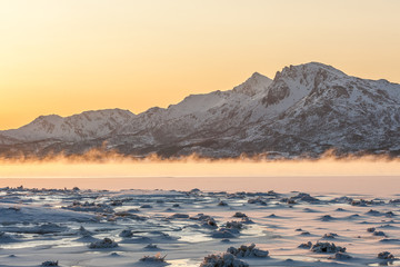 Amazing sunrise over Lofoten island, Norway. Dramatic winter landscape