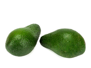 Two avocado isolated on a white background.