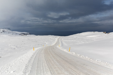 Winter road. Snow desert spring landscape in Northern Europe. iceland