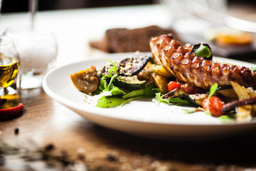 Octopus salad served on a plate in restaurant