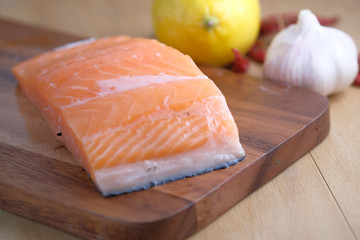 Closeup of salmon raw fish with vegetable 