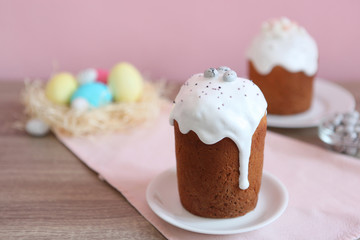 Traditional easter cake on the table. Traditional treats for Easter. Festive easter background. Place for text. Minimalism.