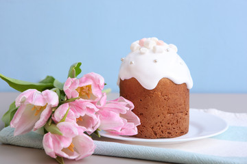 Traditional easter cake on the table. Traditional treats for Easter. Festive easter background. Place for text. Minimalism.