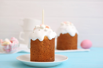 Traditional easter cake on the table. Traditional treats for Easter. Festive easter background. Place for text. Minimalism.