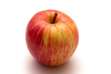 red and yellow Apple whole on an isolated white background