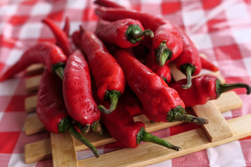 Close up of red chili on table, extra hot concept 