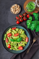 Homemade tortiglioni pasta with vegan pesto sauce