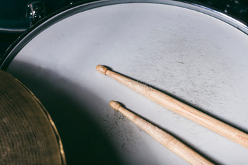 Snare drum and a pair of drum sticks