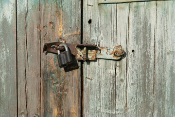 Old wooden gate with Chain key lock