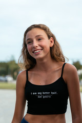 Portrait of teenage girl at park