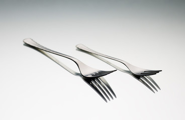 Still life of two metal forks
