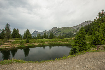 Fototapeta na wymiar Lake Flesch on a cloudy day in the mountains