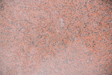 Texture of snowy red granite slab