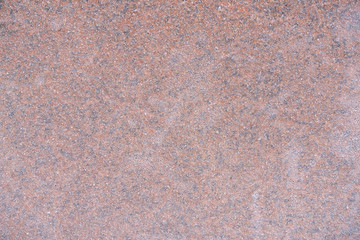 Texture of snowy red granite slab