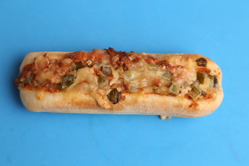 hot dog with cheese and pepper