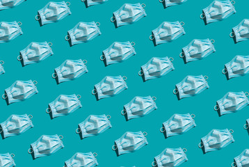 Medical mask against a virus on a blue background. Pattern