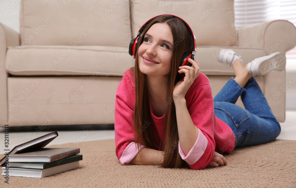 Sticker Woman listening to audiobook lying on floor at home