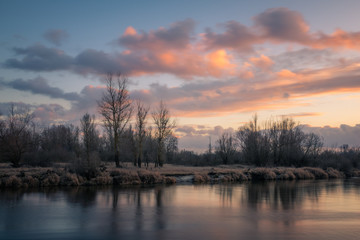 Fototapeta na wymiar Sunset over the Pilica river near Mniszew, Poland