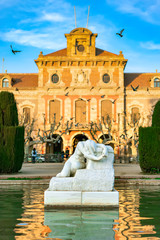 Sculpture of woman in the pool in front of Parliament of Catalonia, park Ciutadella, Barcelona.