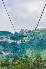 Cable car support with load-bearing ropes. The support is installed on a high-altitude area.