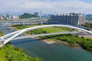 Aerial sunny view of the Sunshine Bridge with cityscape