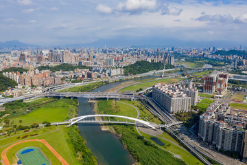 Aerial sunny view of the Sunshine Bridge with cityscape