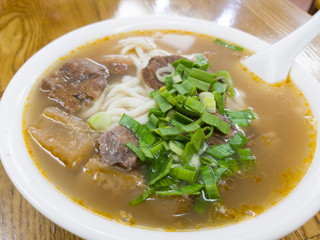 Close up shot of a bowl of beef noodle