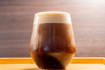Close up shot of a cup of cold coffee