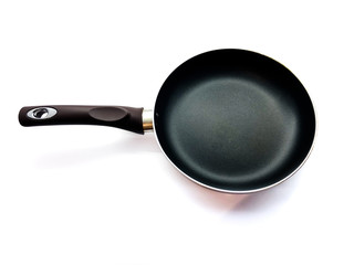 Frying pan isolated on a white background. Black frying pan. Aluminum pan for cooking. Fry. Professional frying pan for the cook. 